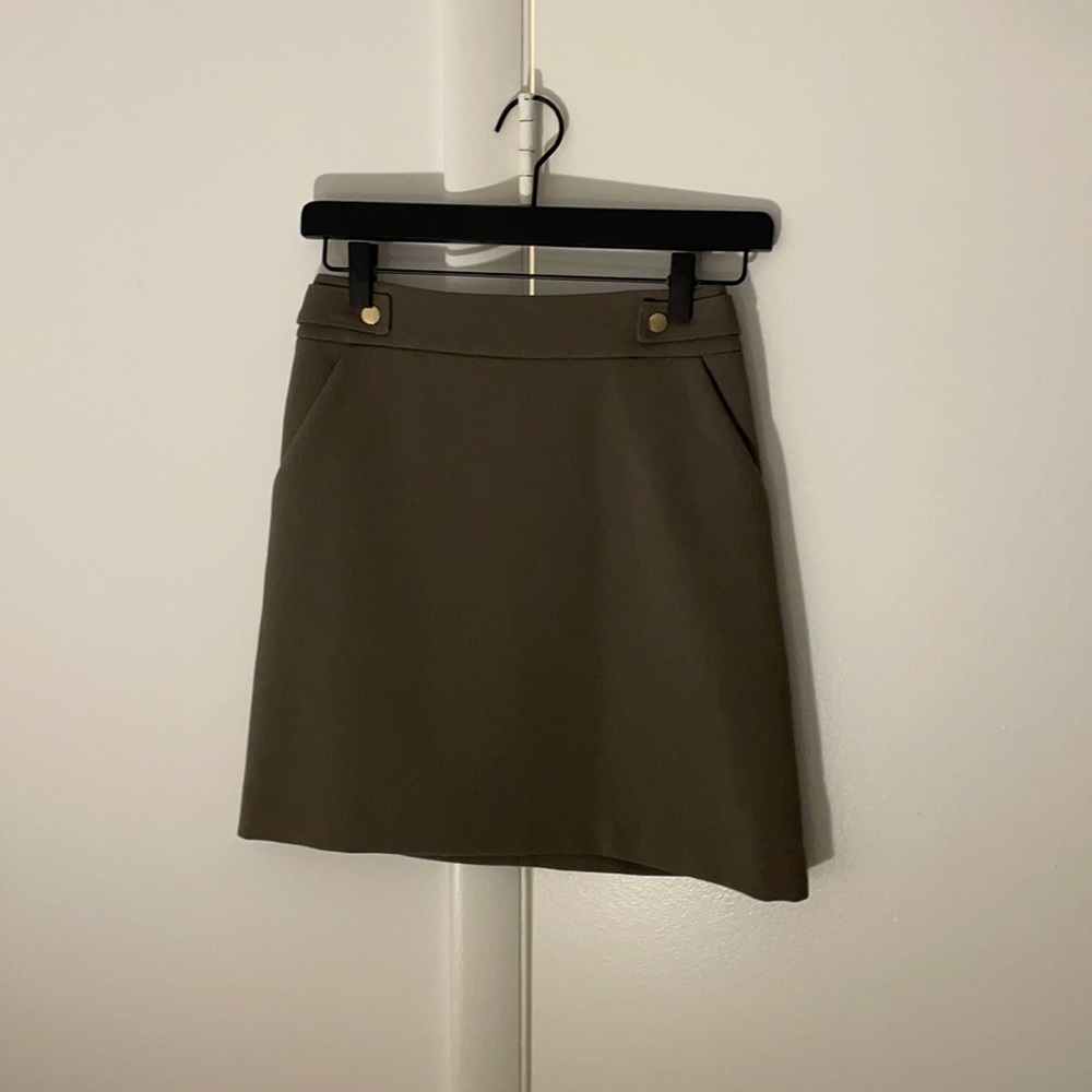Dark green mini skirt